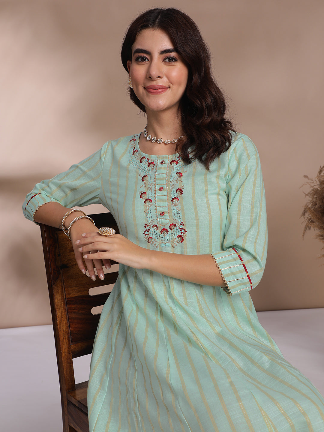 Mint Green Embroidered Anarkali Kurti with Golden Stripes & Lace Detailing