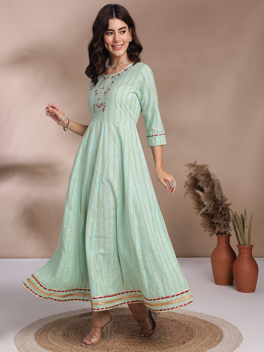 Mint Green Embroidered Anarkali Kurti with Golden Stripes & Lace Detailing