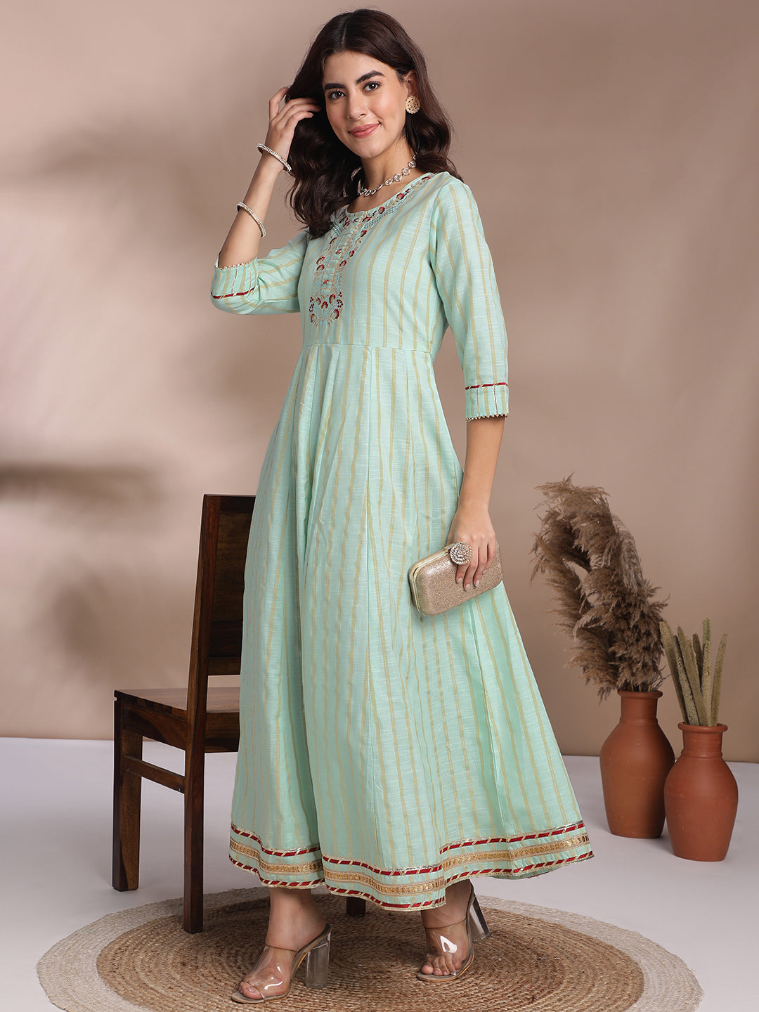 Mint Green Embroidered Anarkali Kurti with Golden Stripes & Lace Detailing